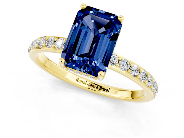Yellow gold Emerald Cut Blue Sapphire Solitaire Ring with Pavé Band and Hidden Halo