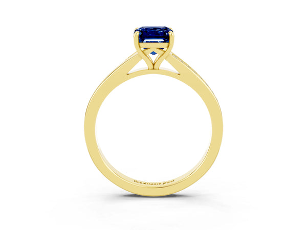 Yellow gold Emerald Cut Blue Sapphire Solitaire Ring with Pavé Band and Prong Setting