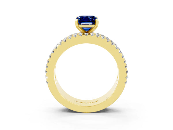 Yellow gold Emerald Cut Blue Sapphire Solitaire Ring with Pavé and Channel Set Band