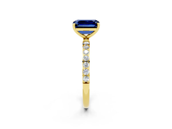 Yellow gold Emerald Cut Blue Sapphire Solitaire Ring with Round  Pavé Band and Prong Setting