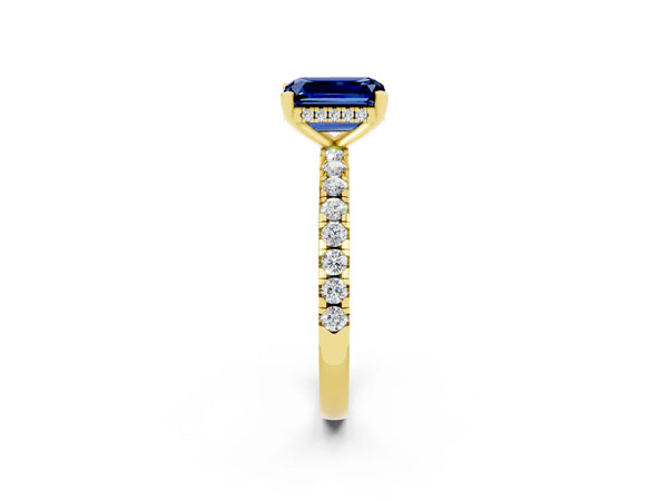 Yellow gold Emerald Cut Blue Sapphire Solitaire Ring with Round Pavé Band and Four-Prong Setting