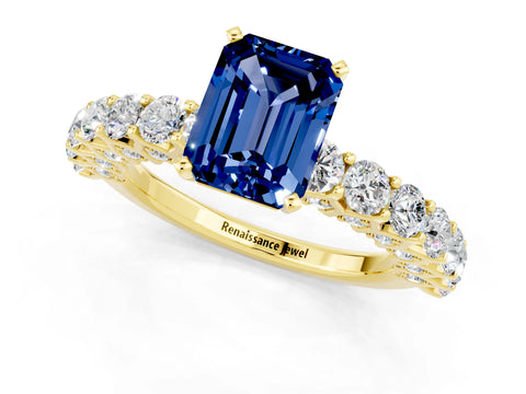 Yellow gold Emerald Cut Blue Sapphire Solitaire Ring with Shared Prong Pavé Band and Four-Prong Setting_1