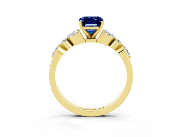 Yellow gold Emerald Cut Blue Sapphire Solitaire Ring with Side Stones and Four-Prong Setting