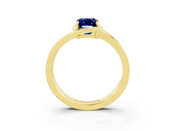 Yellow gold Emerald Cut Blue Sapphire Solitaire Ring with Split Shank and Prong Setting