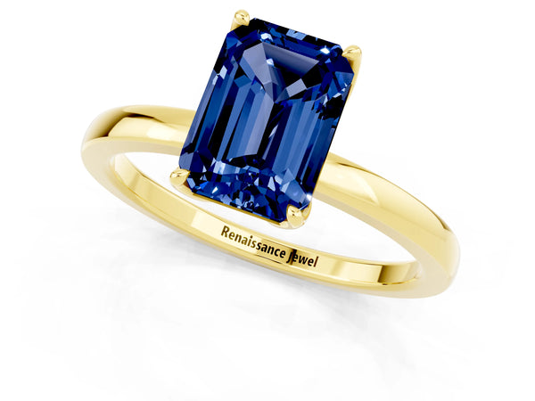 Yellow gold Emerald Cut Blue Sapphire Solitaire Ring with Thin Band and Prong Setting