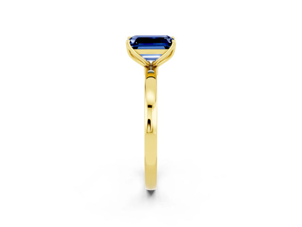 Yellow gold Emerald Cut Blue Sapphire Solitaire Ring with Thin Band and Prong Setting