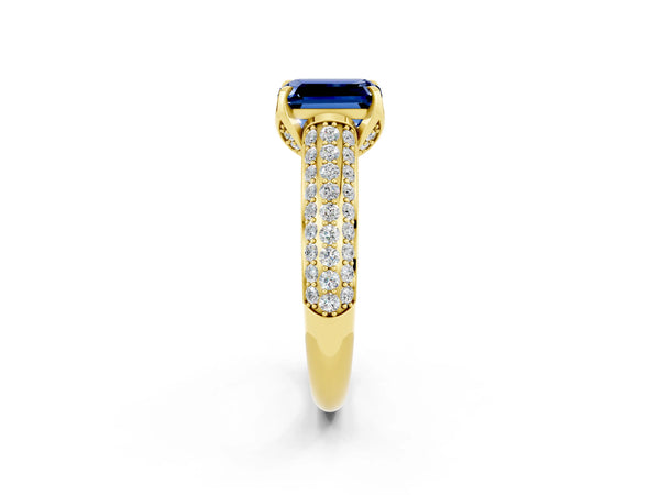 Yellow gold Emerald Cut Blue Sapphire Solitaire Ring with Three-Row Pavé Band and Four-Prong Setting