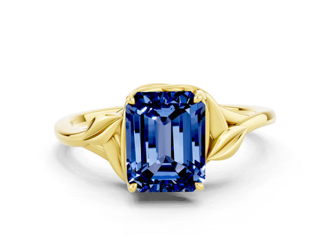 Yellow gold Emerald Cut Blue Sapphire Solitaire Ring with Twist Band and Four-Prong Setting_24