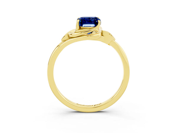 Yellow gold Emerald Cut Blue Sapphire Solitaire Ring with Twist Band and Four-Prong Setting