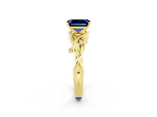 Yellow gold Emerald Cut Blue Sapphire Solitaire Ring with Twisted Band and Prong Setting