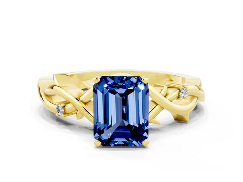 Yellow gold Emerald Cut Blue Sapphire Solitaire Ring with Twisted Band and Prong Setting