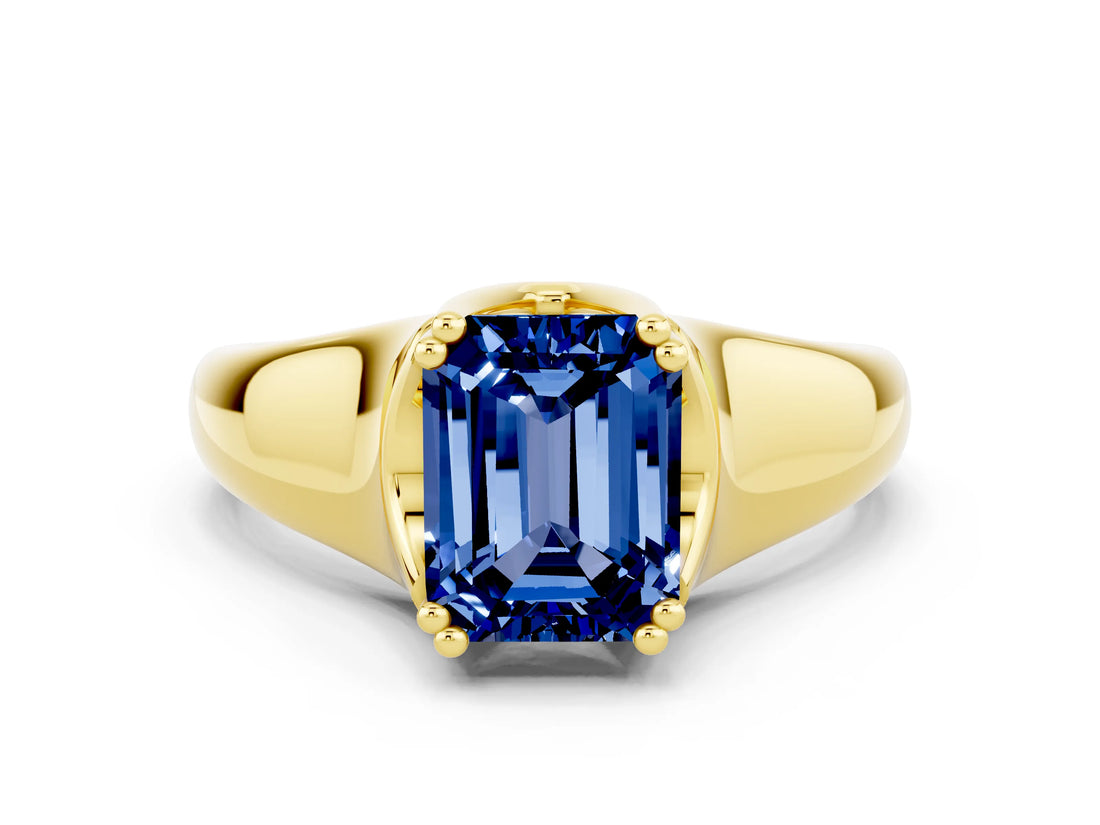 Yellow gold Emerald Cut Blue Sapphire Solitaire Ring with Wide Band and Prong Setting