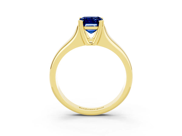 Yellow gold Emerald Cut Blue Sapphire Solitaire Ring with Wide Band and Prong Setting