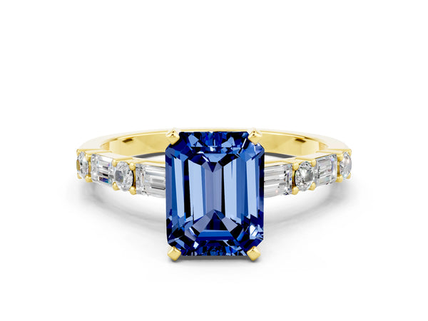 Yellow gold Emerald Cut Blue Sapphire Solitaire with Side Baguettes and Channel Set Band