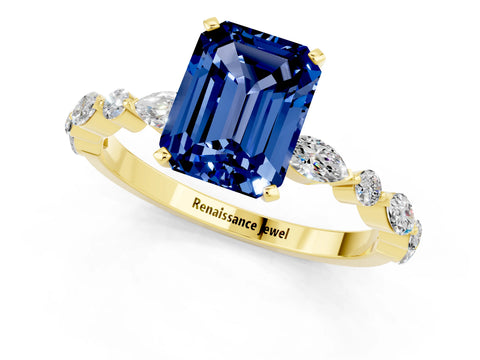 Yellow gold Emerald Cut Blue Sapphire Solitaire with Side Stones on a Pavé Band and Four-Prong Setting_1