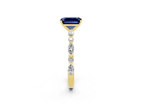 Yellow gold Emerald Cut Blue Sapphire Ring with Marquise and Round  Side Stones and Four-Prong Setting