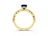 Yellow gold Emerald Cut Blue Sapphire Solitaire with Side Stones on a Pavé Band and Four-Prong Setting_3