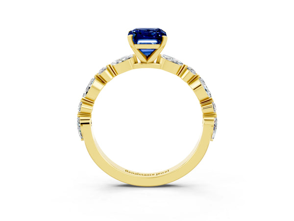 Yellow gold Emerald Cut Blue Sapphire Ring with Marquise and Round  Side Stones and Four-Prong Setting