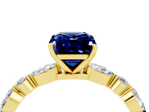 Yellow gold Emerald Cut Blue Sapphire Solitaire with Side Stones on a Pavé Band and Four-Prong Setting_4