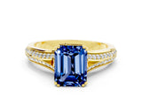 Yellow gold Emerald Cut Blue Sapphire Split Shank Engagement Ring with Pavé Band