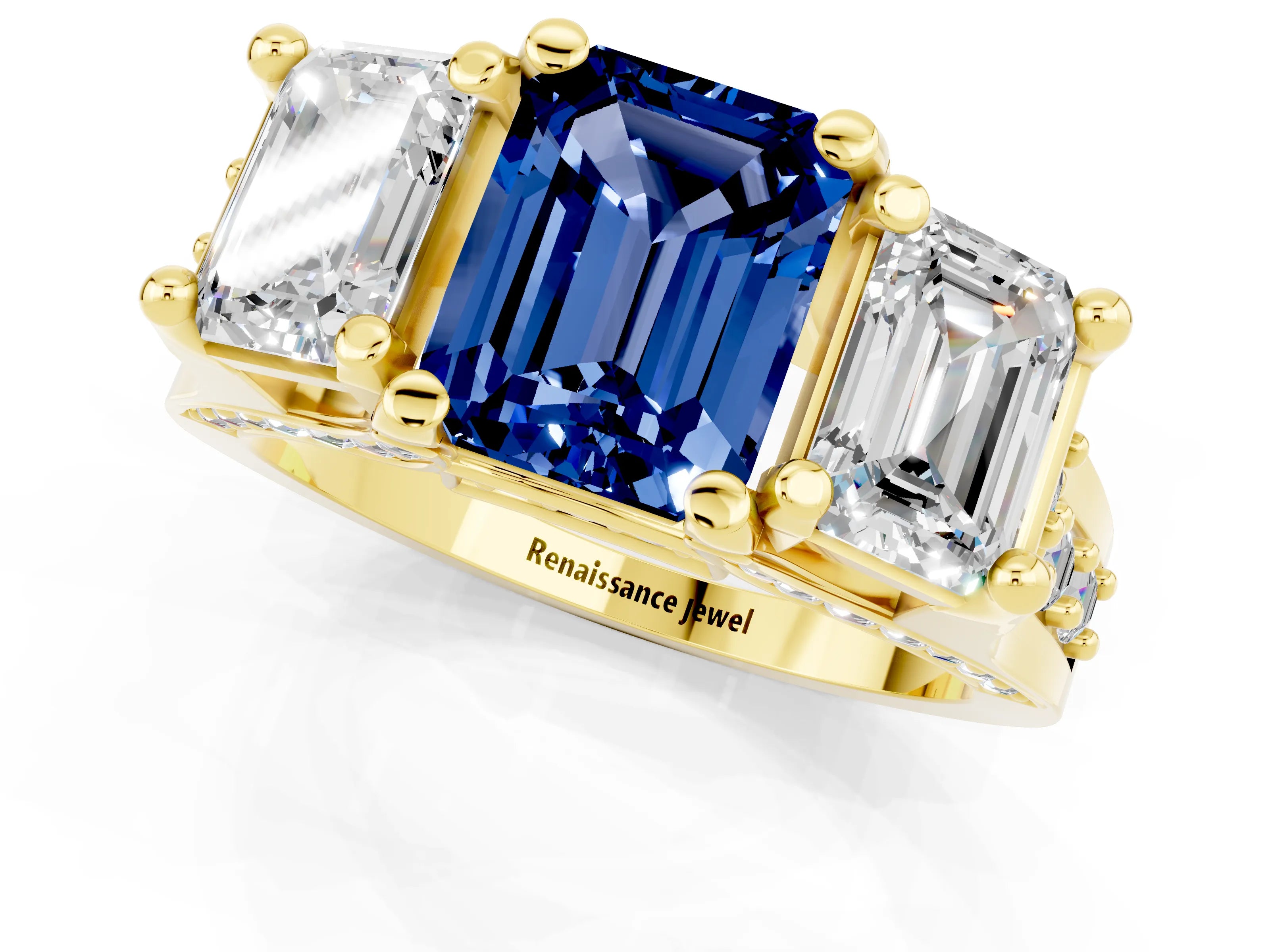 Yellow gold Emerald Cut Blue Sapphire Three-Stone Ring with Channel Set Band and Four-Prong Setting_1