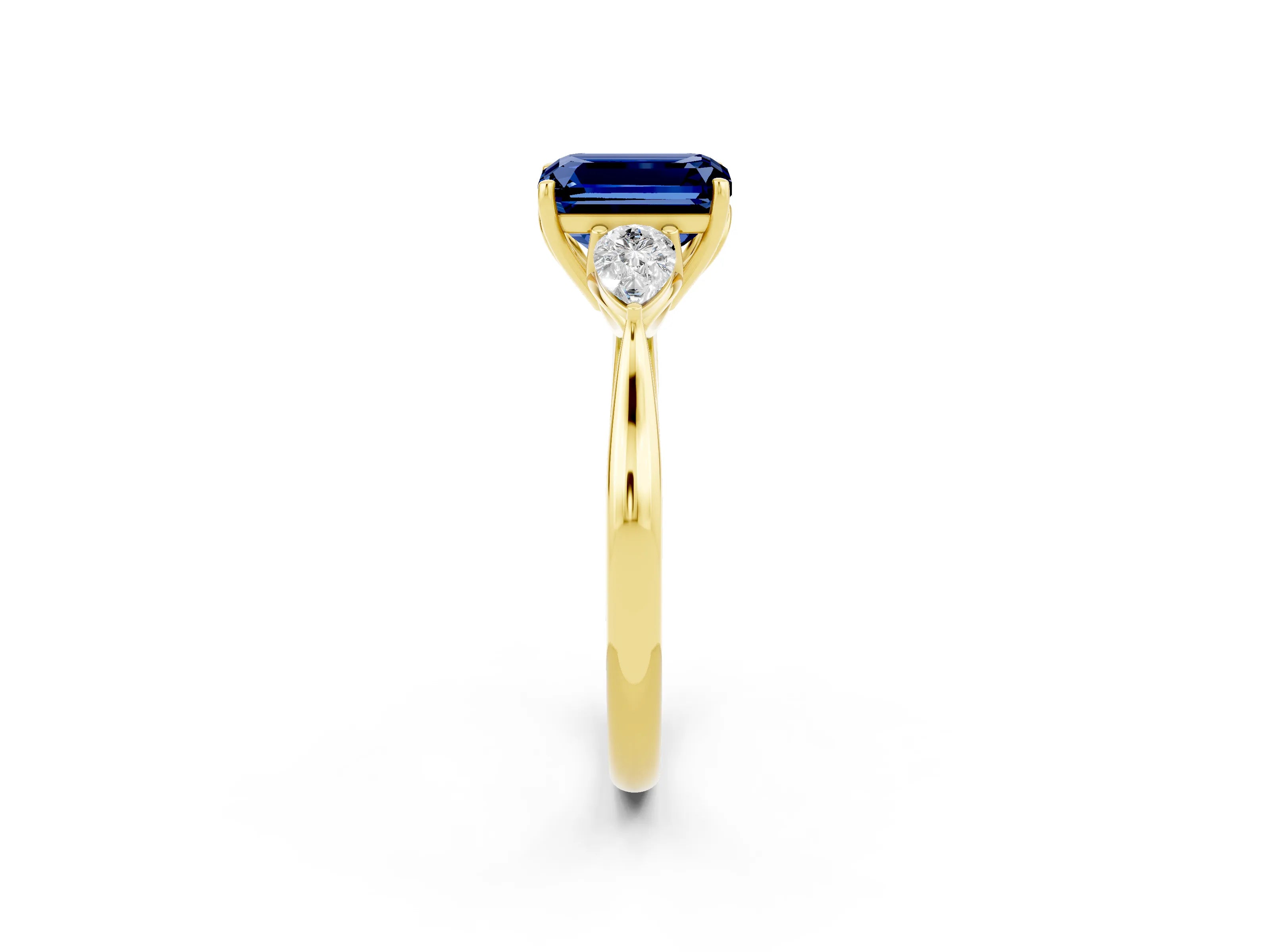 Yellow gold Emerald Cut Blue Sapphire Three-Stone Ring with Pear Side Stones and Four-Prong Setting_14