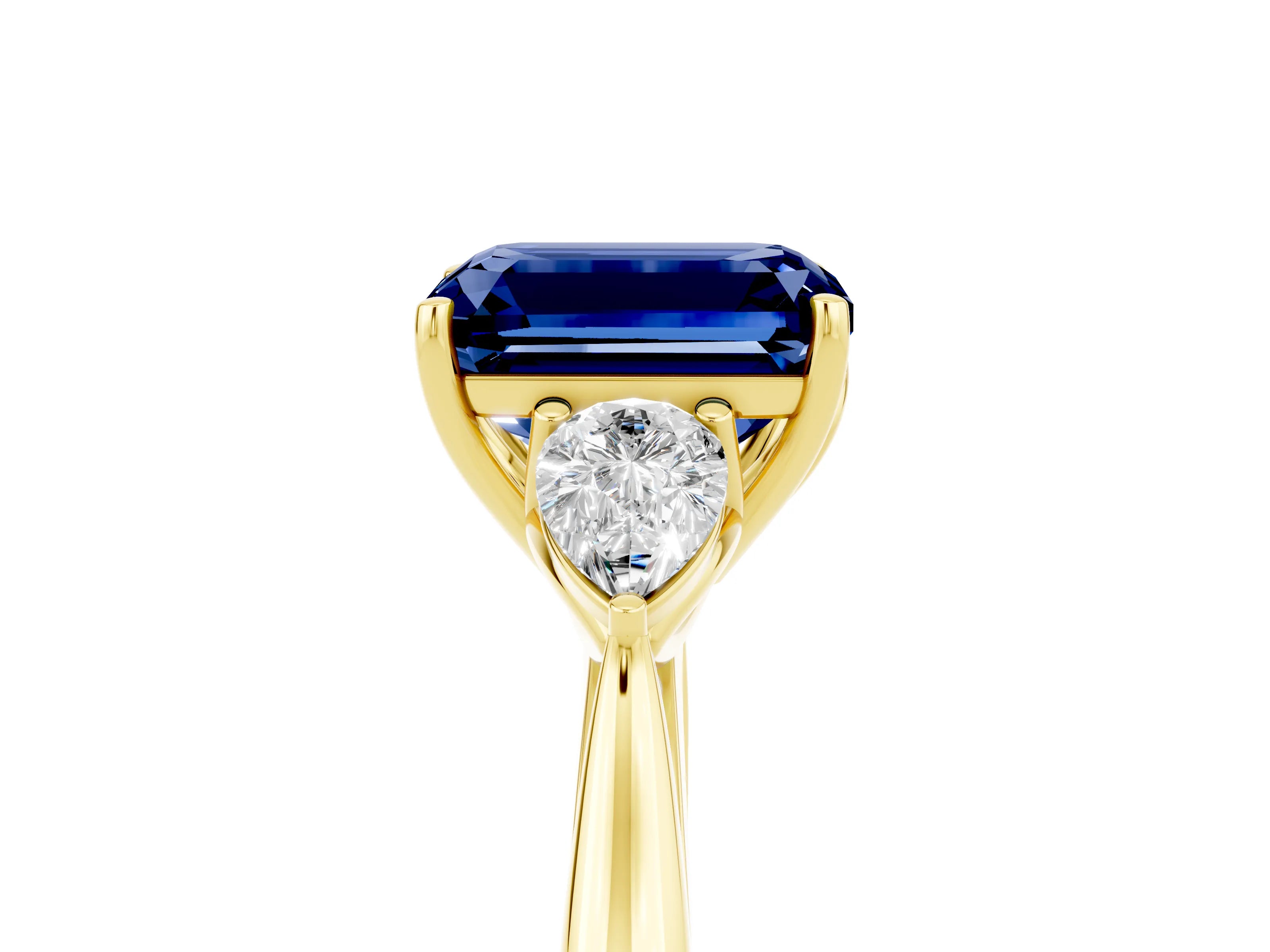 Yellow gold Emerald Cut Blue Sapphire Three-Stone Ring with Pear Side Stones and Four-Prong Setting_17