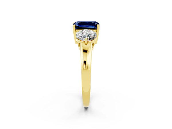 Yellow gold Emerald Cut Blue Sapphire Three-Stone Ring with Prong Setting and Classic Band