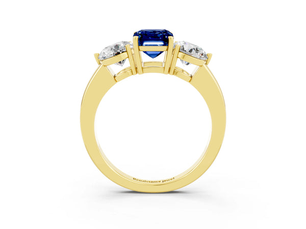 Yellow gold Emerald Cut Blue Sapphire Three-Stone Ring with Prong Setting and Classic Band