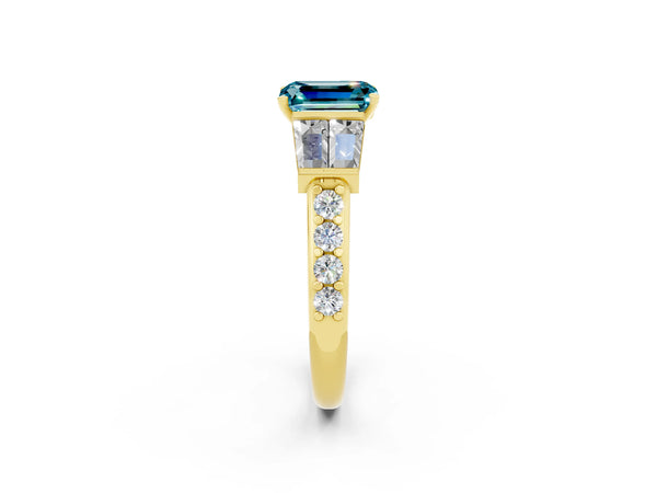 Yellow gold Emerald Cut Blue Topaz Engagement Ring with Baguette Side Stones and Channel Set Band