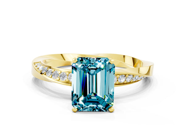 Yellow gold Emerald Cut Blue Topaz Engagement Ring with Side Stone Accents and Four-Prong Setting