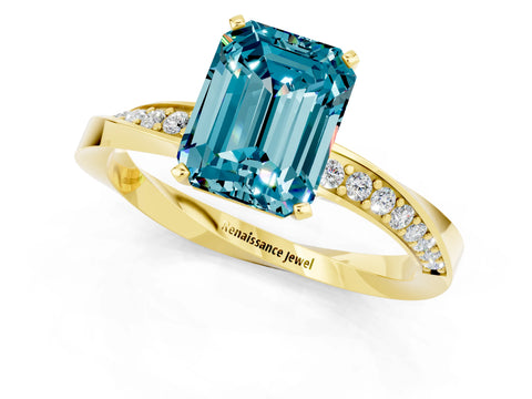 Yellow gold Emerald Cut Blue Topaz Engagement Ring with Side Stone Accents and Four-Prong Setting_28