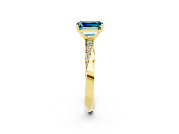 Yellow gold Emerald Cut Blue Topaz Engagement Ring with Side Stone Accents and Four-Prong Setting