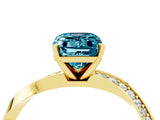 Yellow gold Emerald Cut Blue Topaz Engagement Ring with Side Stone Accents and Four-Prong Setting_64