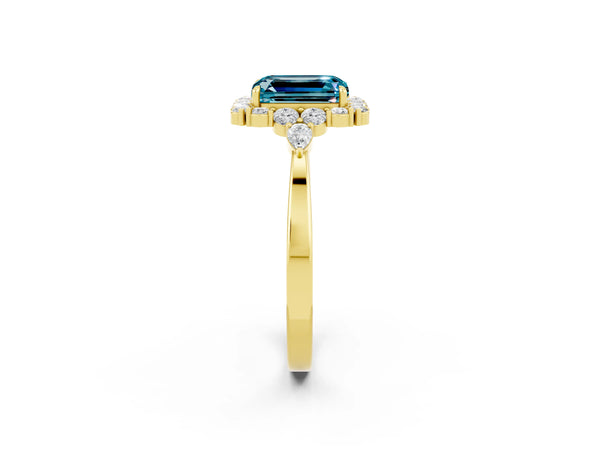 Yellow gold Emerald Cut Blue Topaz Halo Ring with Pear Side Stones and Prong Setting