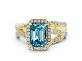Yellow gold Emerald Cut Blue Topaz Halo Ring with Round Split Shank and Prong Setting_48