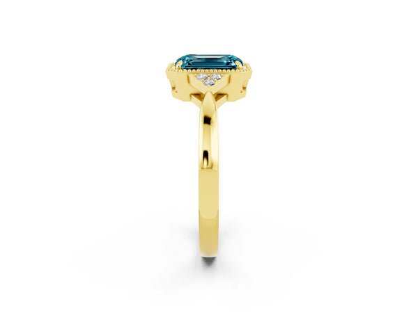Yellow gold Emerald Cut Blue Topaz Halo Ring with Tapered Band and Four-Prong Setting