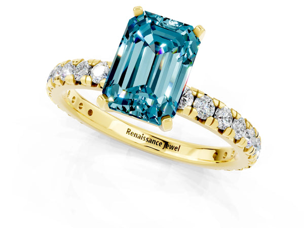Yellow gold Emerald Cut Blue Topaz Pavé Solitaire Ring with Round Band and Prong Setting