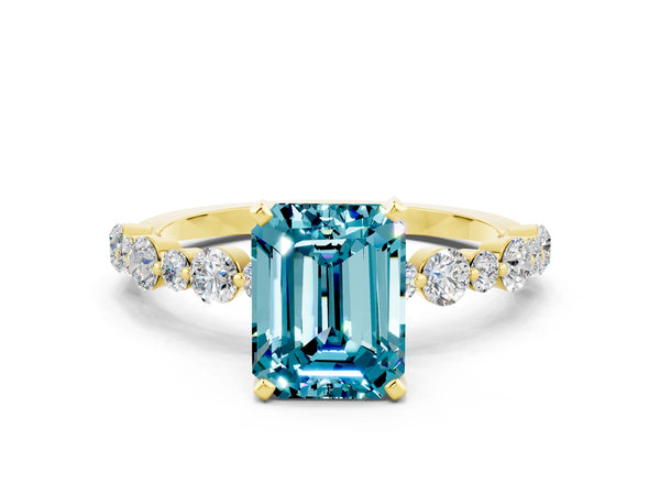 Yellow gold Emerald Cut Blue Topaz Prong Set Engagement Ring with Pavé Band