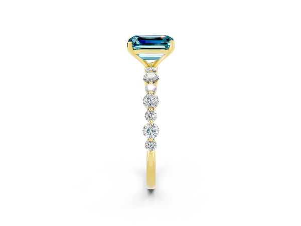 Yellow gold Emerald Cut Blue Topaz Prong Set Engagement Ring with Pavé Band