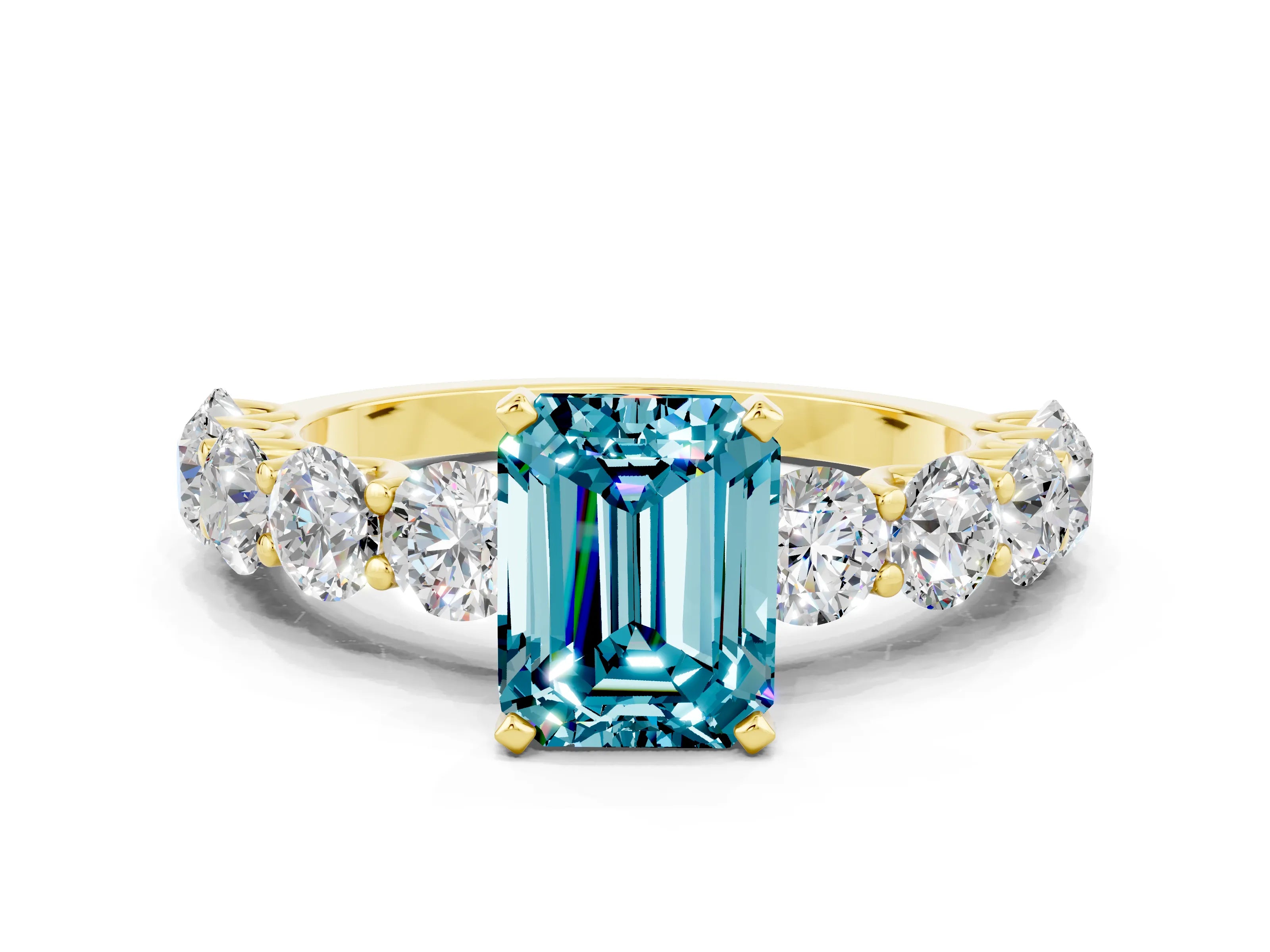 Yellow gold Emerald Cut Blue Topaz Prong Setting with Side Stones on a Pave Band