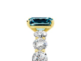 Yellow gold Emerald Cut Blue Topaz Prong Setting with Side Stones on a Pave Band_5