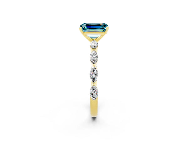 Yellow gold Emerald Cut Blue Topaz Ring with Marquise Side Stones and Prong Setting