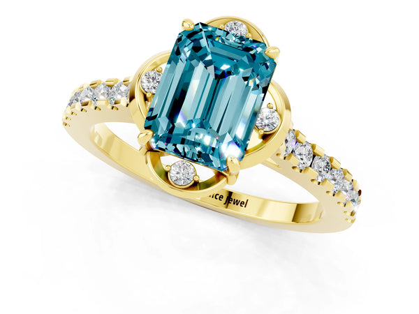 Yellow gold Emerald Cut Blue Topaz Ring with Pavé Band and Floral Prong Setting