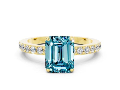 Yellow gold Emerald Cut Blue Topaz Ring with Pavé Band and Four-Prong Setting