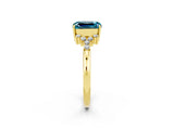 Yellow gold Emerald Cut Blue Topaz Ring with Side Stones and Four-Prong Setting_38