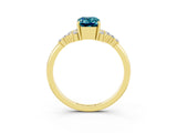 Yellow gold Emerald Cut Blue Topaz Ring with Side Stones and Four-Prong Setting_39
