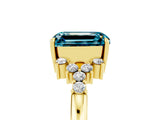 Yellow gold Emerald Cut Blue Topaz Ring with Side Stones and Four-Prong Setting_41