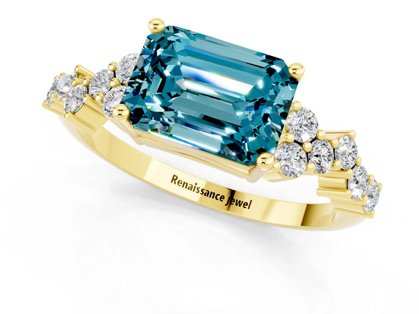 Yellow gold Emerald Cut Blue Topaz Scattered Round Accent Ring with Prong Setting
