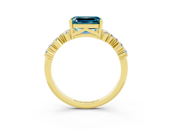 Yellow gold Emerald Cut Blue Topaz Scattered Round Accent Ring with Prong Setting